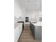 Contemporary kitchen with an island, modern appliances, and stylish fixtures at 17364 Pinellas Ave, Westfield, IN 46074