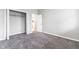 Bedroom with closet and view to living area at 1820 E Maryland St, Indianapolis, IN 46201