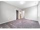 Bedroom with closet and view to living area at 1820 E Maryland St, Indianapolis, IN 46201