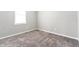 Bedroom with plush carpet and natural light at 1820 E Maryland St, Indianapolis, IN 46201