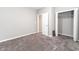 Bedroom featuring neutral paint and a closet at 1820 E Maryland St, Indianapolis, IN 46201