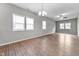 Spacious living room with wood-look floors and bright, natural light at 1820 E Maryland St, Indianapolis, IN 46201