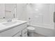 Well-lit bathroom with white vanity, modern fixtures, and a combination tub and shower at 19568 Astoria Ave, Sheridan, IN 46069