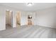 Spacious bedroom with access to an ensuite bathroom and kitchen area, showcasing a functional layout at 19568 Astoria Ave, Sheridan, IN 46069