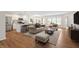 Open-concept space featuring a kitchen, dining area, and living area with neutral decor at 19568 Astoria Ave, Sheridan, IN 46069