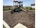 Community playground featuring slides, climbing structures, and pea gravel ground cover at 19568 Astoria Ave, Sheridan, IN 46069