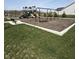Community playground with slides, swings, a bench, and a well-maintained lawn at 19568 Astoria Ave, Sheridan, IN 46069