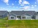Spacious backyard with well-kept lawn and patio at 19568 Astoria Ave, Sheridan, IN 46069