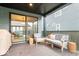 Outdoor patio featuring covered space with cozy seating and view to the yard at 2026 Alvord St, Indianapolis, IN 46202