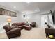 Large finished basement offering comfortable seating, recessed lighting, and entertainment area at 2026 Alvord St, Indianapolis, IN 46202