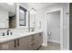 Modern bathroom featuring double sink vanity, neutral walls, modern fixtures, and a glass enclosed shower at 2026 Alvord St, Indianapolis, IN 46202