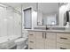 This bright bathroom showcases a glass-enclosed shower, modern fixtures, and a stylish vanity at 2026 Alvord St, Indianapolis, IN 46202