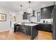 Stylish kitchen with a center island, pendant lighting, and modern appliances at 2026 Alvord St, Indianapolis, IN 46202