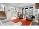 Cozy living room with a fireplace, hardwood floors, and comfortable seating area at 2026 Alvord St, Indianapolis, IN 46202