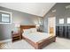 Spacious main bedroom features neutral walls, carpet flooring, side tables, and an adjoining bathroom at 2026 Alvord St, Indianapolis, IN 46202