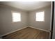Cozy bedroom with new flooring, fresh paint and two bright windows at 2261 N Centennial St, Indianapolis, IN 46222
