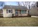 Charming home with a cozy front porch and red shutters at 2261 N Centennial St, Indianapolis, IN 46222