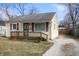 Charming home with a cozy front porch and long driveway at 2261 N Centennial St, Indianapolis, IN 46222