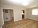 Living room featuring new laminate flooring and neutral paint at 2261 N Centennial St, Indianapolis, IN 46222