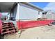 The backyard features a covered patio at 243 S 3Rd Ave, Beech Grove, IN 46107