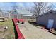 The backyard features a detached garage and a fire pit at 243 S 3Rd Ave, Beech Grove, IN 46107