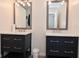 Bathroom featuring double vanities, modern fixtures, and contemporary design at 243 S 3Rd Ave, Beech Grove, IN 46107
