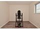 Exercise room featuring wood flooring and an inversion table at 243 S 3Rd Ave, Beech Grove, IN 46107