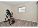 Exercise room featuring wood flooring and an inversion table at 243 S 3Rd Ave, Beech Grove, IN 46107