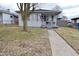 Charming single-story home with a well-maintained lawn and inviting curb appeal at 243 S 3Rd Ave, Beech Grove, IN 46107