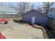 The backyard features a detached garage at 243 S 3Rd Ave, Beech Grove, IN 46107