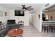 Bright living room featuring plank floors and an open layout leading to other areas of the house at 243 S 3Rd Ave, Beech Grove, IN 46107