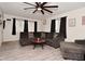 Inviting living room with a corner sofa, plank floors, and stylish decor at 243 S 3Rd Ave, Beech Grove, IN 46107