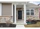 Close-up view of the home's front porch and facade at 2556 Lamar Dr, Whitestown, IN 46075
