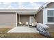 Inviting covered patio with comfortable seating and a view of the backyard at 2556 Lamar Dr, Whitestown, IN 46075