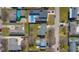 Aerial view features the property's location, nearby homes, and a swimming pool in the neighborhood at 2665 Chestnut St, Columbus, IN 47201