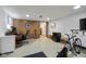 Functional basement space with a desk and exercise equipment, creating a versatile area for work and fitness at 2665 Chestnut St, Columbus, IN 47201