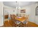 Dining room with a classic chandelier, wooden table, and traditional decor at 2665 Chestnut St, Columbus, IN 47201
