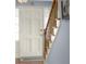 Welcoming front entrance with a classic white door, sidelights, and wooden staircase accents at 2665 Chestnut St, Columbus, IN 47201