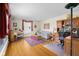 Cozy living room with hardwood floors, a comfortable sofa, and ample natural light at 2665 Chestnut St, Columbus, IN 47201
