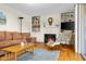 Inviting living room featuring a fireplace, built-in shelving, and comfortable seating with ample natural light at 2665 Chestnut St, Columbus, IN 47201