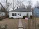 Street view of a cozy one-story home featuring a tidy front lawn and traditional architecture at 2959 N Lasalle St, Indianapolis, IN 46218