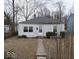 Quaint one-story house with a neat front yard and inviting entrance walkway at 2959 N Lasalle St, Indianapolis, IN 46218