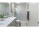 Bright bathroom featuring a sink with marble countertop and glass shower at 3232 Beech Dr, Columbus, IN 47203