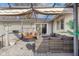 Relax on this cozy deck with comfortable seating, a shaded pergola, and tranquil backyard views, perfect for entertaining at 3232 Beech Dr, Columbus, IN 47203
