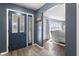 Inviting foyer leading into a bright living area with hardwood floors at 3232 Beech Dr, Columbus, IN 47203