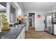 A kitchen with stainless steel appliances and view to the hallway at 3232 Beech Dr, Columbus, IN 47203