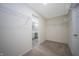 Walk-in closet with wire shelving, and view of ensuite bath at 3328 Stoddard Pl, Indianapolis, IN 46217