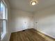 Well-lit bedroom with new floors and two closets at 3516 N Sherman Dr, Indianapolis, IN 46218