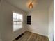 Charming hallway with natural lighting, modern floors, and built-in storage space at 3516 N Sherman Dr, Indianapolis, IN 46218