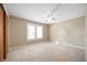 This is a spacious bedroom, equipped with a ceiling fan and natural light from the double hung windows at 3626 St. Charles St, Anderson, IN 46013